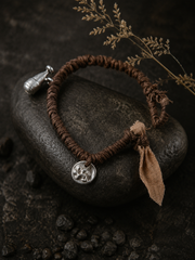 Handmade Plant-Dyed Braided Bracelet with Tibetan Charms