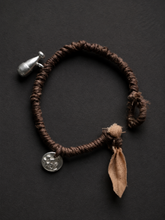 Handmade Plant-Dyed Braided Bracelet with Tibetan Charms