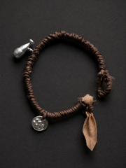Handmade Plant-Dyed Braided Bracelet with Tibetan Charms