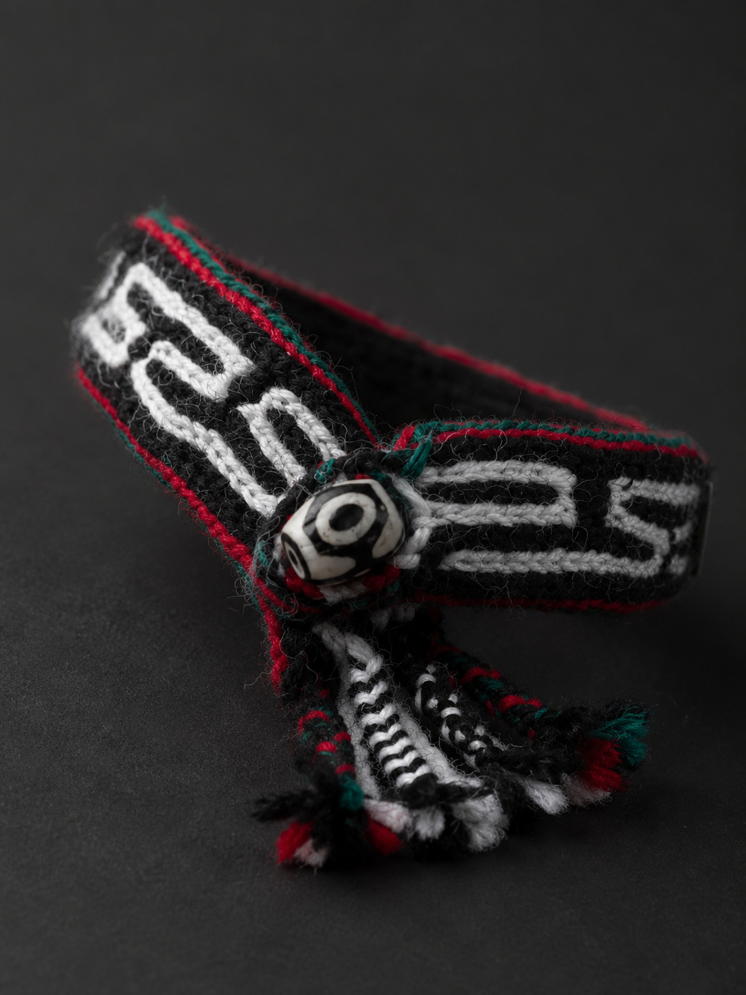 Hand-Woven Tibetan Wool Bracelet with Dzi Bead