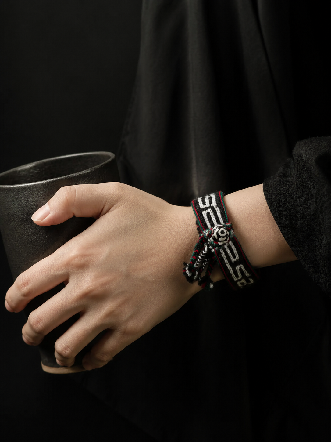 Hand-Woven Tibetan Wool Bracelet with Dzi Bead