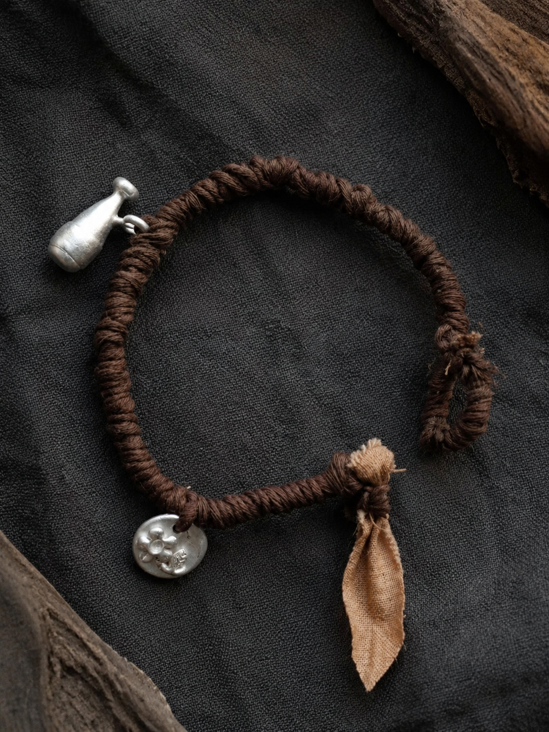 Handmade Plant-Dyed Braided Bracelet with Tibetan Charms