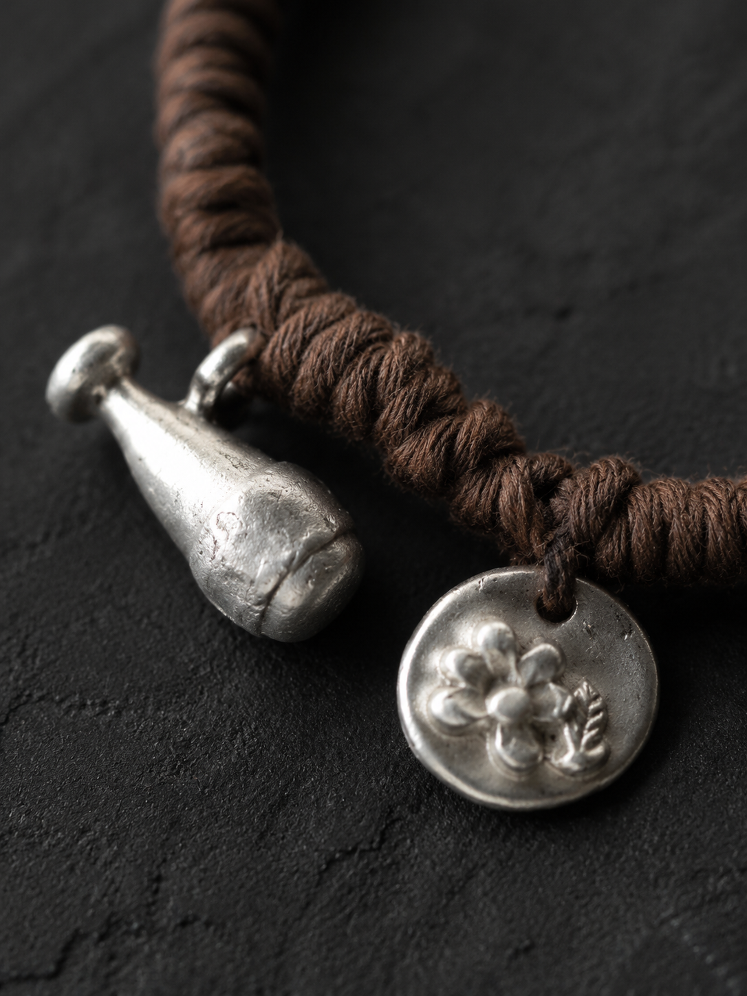Handmade Plant-Dyed Braided Bracelet with Tibetan Charms