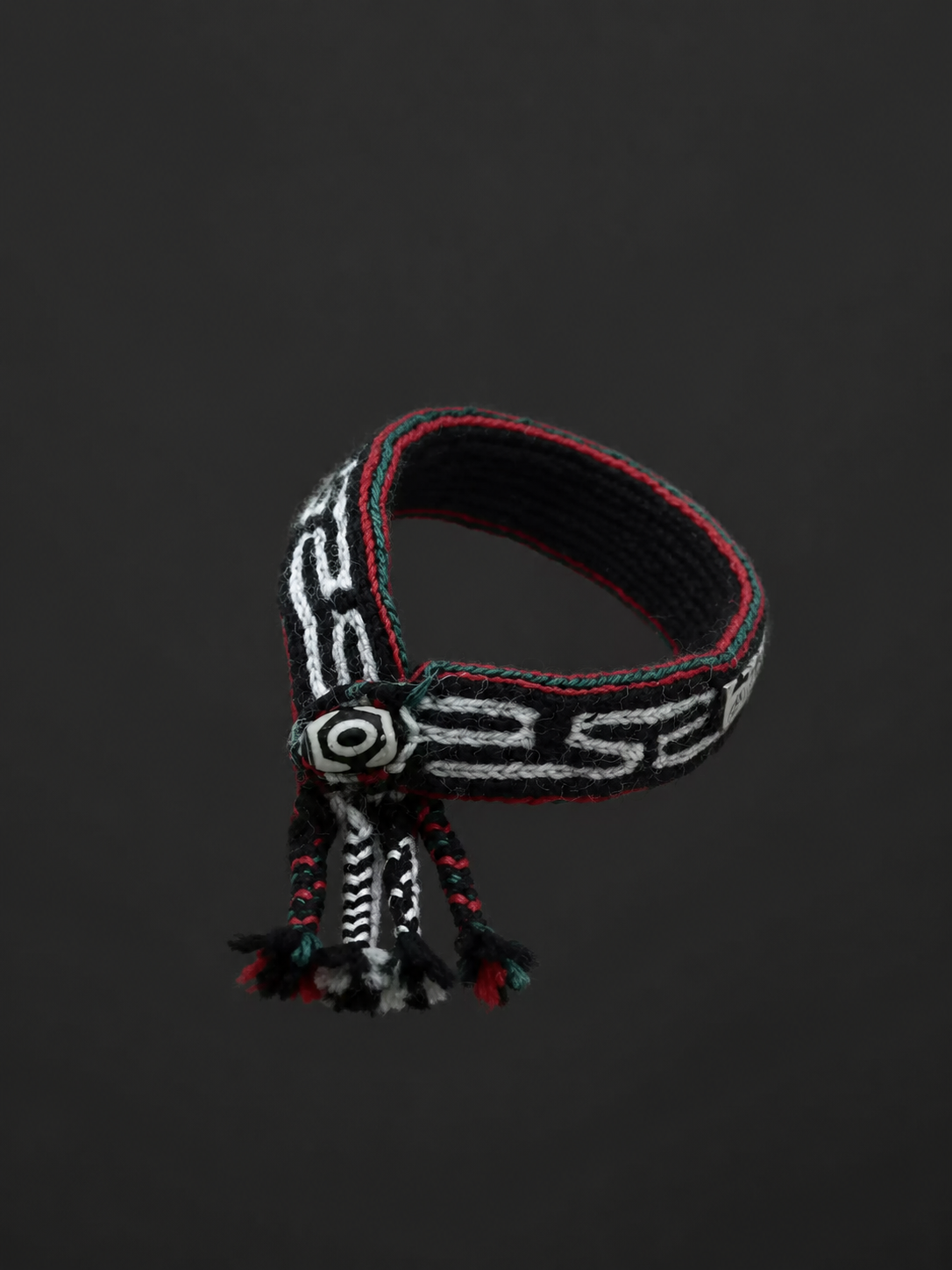 Hand-Woven Tibetan Wool Bracelet with Dzi Bead